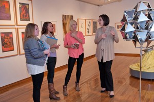 group talking in gallery