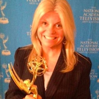 Williams holds award